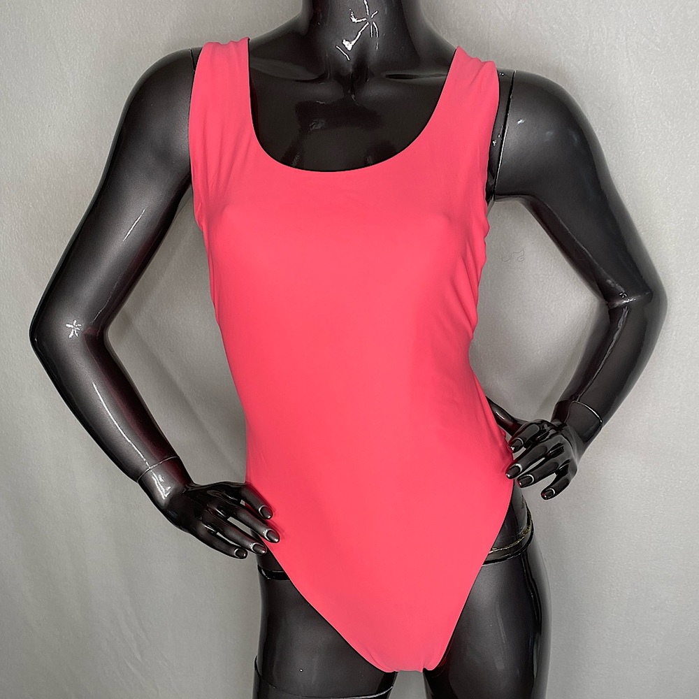 AERIE PINK ON ONE-SIDE & ORANGE ON THE OTHER . ONE PIECE SWIMSUIT